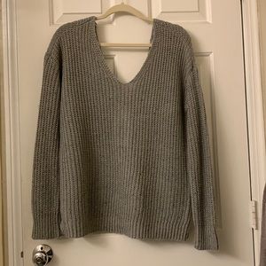 Small grey sweater with crisscross back